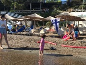 Baby swimming at the see